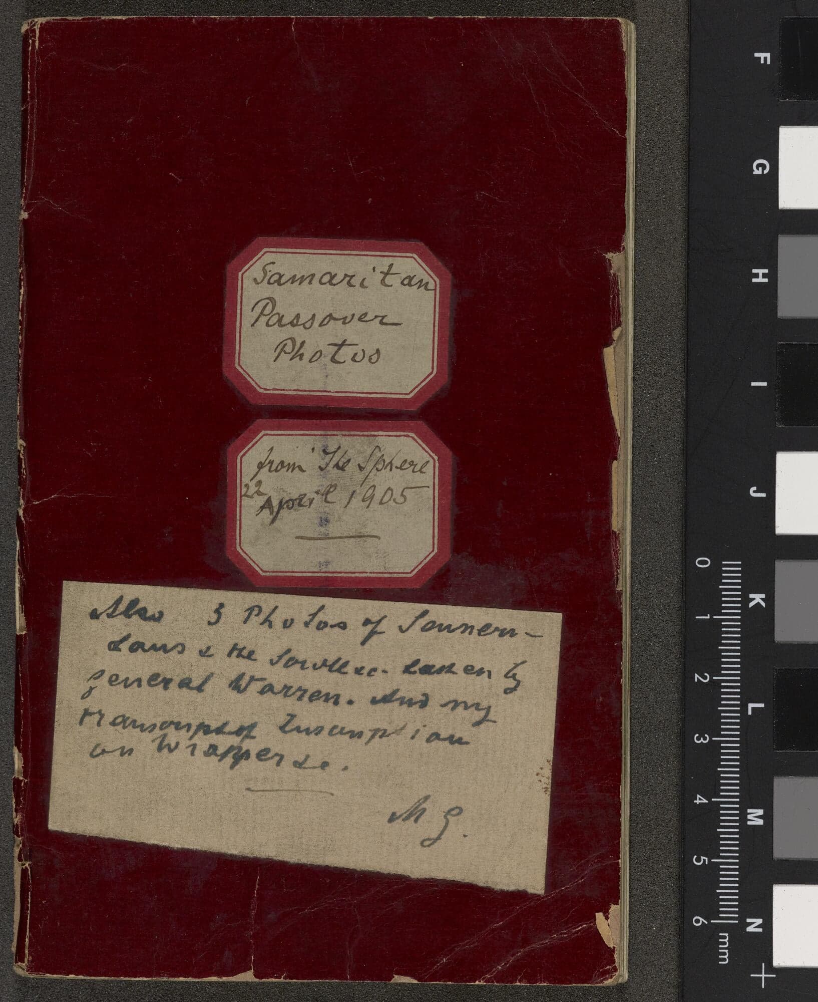 Scrapbook with newspaper cuttings and photographs